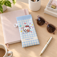 Blue kitty glasses pouch on a study desk