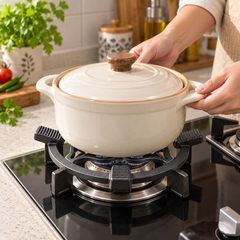 WokMate Stove Support Stand supporting a covered pot