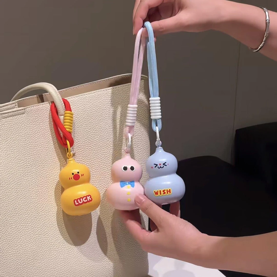 Original photo of all three gourd keychain designs