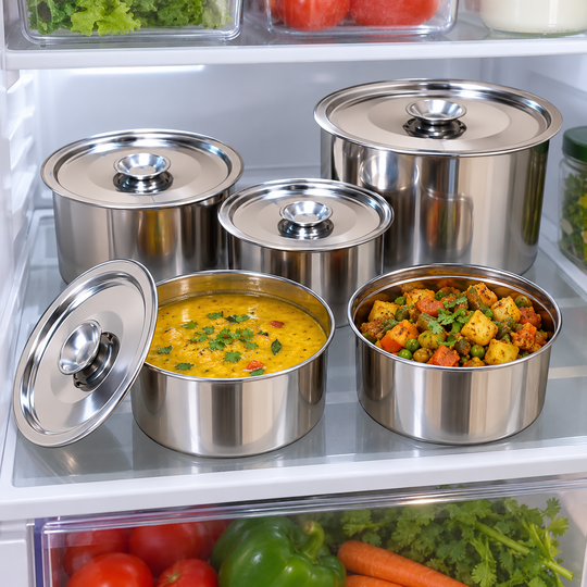 Leftover dal and sabzi stored neatly inside a refrigerator