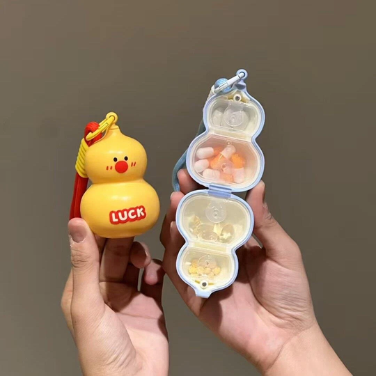 Original photo of yellow and blue gourd keychain organizers