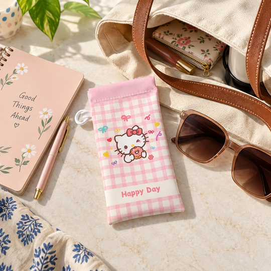 Pink kitty glasses pouch beside tote bag and sunglasses