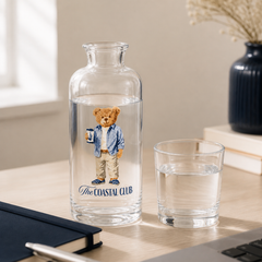 Teddy Bear Glass Bottle on a work desk