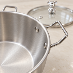 Angular side handle and visible rivet attachments