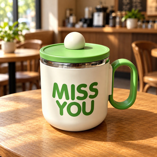 Cozy Sip Mug in green with matching lid and round knob