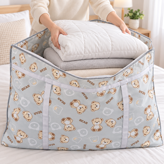 Placing folded bedding inside the Foldable Bear Storage Bag