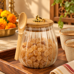 Ribbed glass storage jar in a chai serving setup
