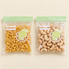 Visible pasta and cashew contents in food bags